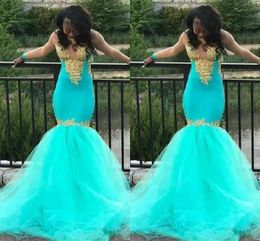 2019 Turquoise Prom Dresses Mermaid With Illusion Long Sleeve Gold Applique Beaded Sequin Jewel See Though Back Evening Gowns Form2572