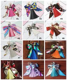 12 Colors Creative Bowknot Flower Tassel Keychain Car Key Ring Bag Pendant Available Material Superman Keychain Backpack accessories mk667