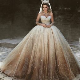 Luxury Sequined Tulle Wedding Dresses Sheer Jewel Neck Long Sleeve Wedding Gown SparKly Fluffy Corset Ball Gown Dubai Wedding Dress