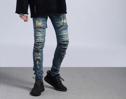 Europe and America high street hole jeans washed rock old knee knife cut feet men's denim trousers