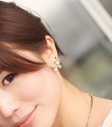 new hot Korean jewelry pearl butterfly hollowed-out color auger earrings free nail exaggerated fashion classic exquisite