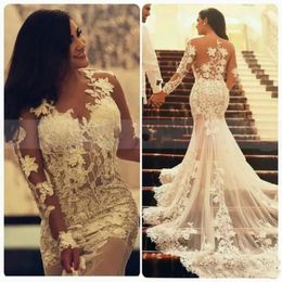 Modest Simple Lace Beach Wedding Dresses African Long Sleeves Sheer Neck Appliques Vintage Arabic Wedding Gowns Plus Size Bridal Dress
