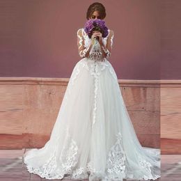 Long Sleeve Wedding Dress Sheer Top Illusion Bodice Sexy Backless Wedding Dresses Romantic Lace Appliques Tulle Bridal Gowns with Train