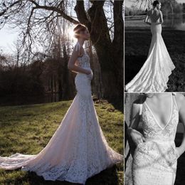 New Sexy Lace Wedding Dresses White Deep V Neck Sleeveless Mermaid Wedding Gowns Backless Chapel Train Lace Bridal Gowns Hot Sale Customed