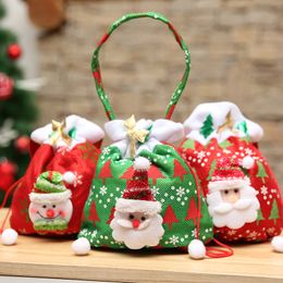 С Рождеством Санта -Манс подарок представляет сумку Рождественский снеговик с снеговиком.