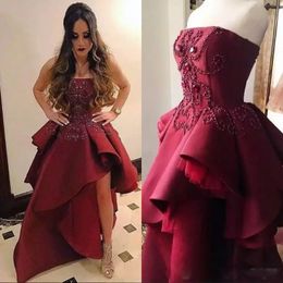 Burgundy Unique Asymmetrical Prom Dress 2018 Fashion A-Line Strapless Crystal Beaded Peplum Evening Party Dress Hand Made Satin Evening Gow