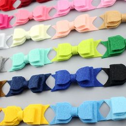 hot selling new style girls' handmade decorative solid felt hair bow for baby headband from china supplier