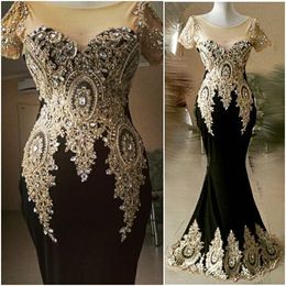 Black Prom Abiti da sera formale Partito da sera Pageant Abiti perline Crystals Mermaid African Dubai Cap Sleeve Neck Sheer Neck