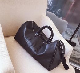 2019 new fashion red black men women travel bag duffle bag, brand designer luggage handbags large capacity sport bag 45CM