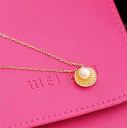 New Style Korea match adorn article female han edition fashionable and simple temperament pearl shell modelling pendant short collarbone nec