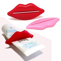 2Pcs Useful Cute Lip Shape Squeezer Dispenser Tool for Toothpaste Red Pink