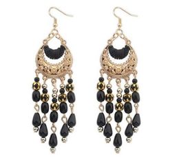 Hot style New earrings Europe and the United States crescent shape Bohemian manual beaded tassel earrings personality fashion sales