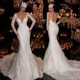 Luxury Ostrich Feather Sexy Mermaid Wedding Dresses Long Sleeves Deep V Neck Backless Sequins Bridal Gowns Sweep Train Wedding Dress