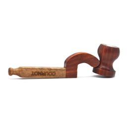 Hand-made wooden pipe, bent pipe, Heather, and wood pipe.