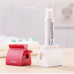 Creative Rolling Tube Tooth Paste Squeezer Toothpaste Dispenser and Cream tube squeezer Tooth Brush Toothbrush Holder Free shipping