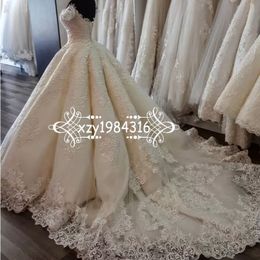 Middle East Princess Wedding Gown Luxury Lace Appliqued Off Shoulder Short Sleeves Ball Gown Wedding Dresses Charming Arabic Bridal Dresses