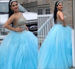 2020 New Gorgeous Sky Blue Quinceanera Ball Gown Dresses Sheer Neck Crystal Beaded Tulle Sweet 16 Sexy Sheer Back Party Prom Evening Gowns