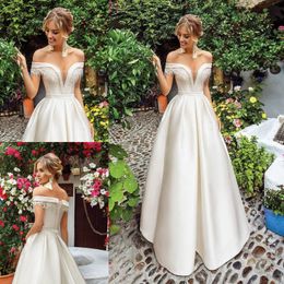 Fabulous Beaded Off Shoulder Wedding Dresses A Line Sheer Plunging Neck Appliqued Bridal Gowns Satin Sweep Train robe de mariée