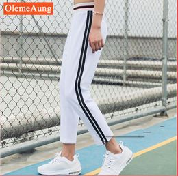 New Autumn and Winter Yoga Pants Women Euro-American Side Zipper Sports Pants Fitness Running Loose Nine-minute Pants