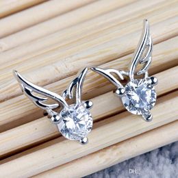 -Boucles d'oreilles en gros en argent sterling 925 zircon aile d'ange en forme d'oreille boucles d'oreilles