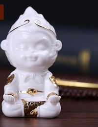 White porcelain fights Buddha Sun Wukong Qitian Dasheng car small monkey ornaments fish tank landscaping living room decorations