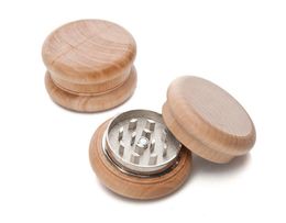 A 55mm circular manual wood grinder with two layers of logs and zinc