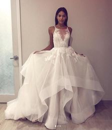 Spaghetti Beach Wedding Dresses 2019 Summer Sheer Neck Lace Appliques Bridal Gowns Tulle Tiered A Line Bridal Gowns Light Cheap Bridal Dress