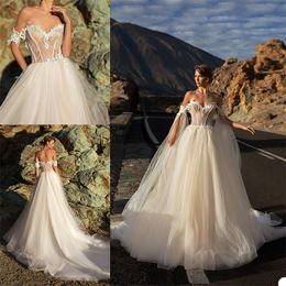 Newest Ari Villoso A-line Wedding Dresses Sweetheart Sleeveless Backless Bridal Gown Appliqued Lace Sequins Sweep Train Robes De Mariée