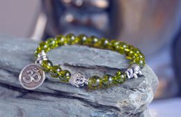 SN0193 Olivine Peridot Bracelet Lotus Buddha Bracelet Heart Chakra healing Lucky Elephant OM bracelet mala beads prayer