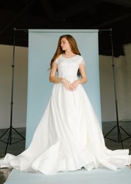 2020 Simple A-line Lace Modest Wedding Dresses With Cap Sleeves Jewel Corset Back Soft Satin Skirt Simple Elegant Modern Modest Bridal Gowns