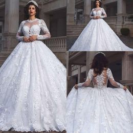 2020 Modest A Line Wedding Dresses Jewel Neck Illusion Lace Appliques Crystal Beads Long Sleeve Sweep Train Sexy Back Plus Size Bridal Gowns