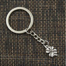 free ship 20pcs/lot Key Ring Keychain Jewelry Silver Plated hollow four Leaf Clover Charms Jewelry Making