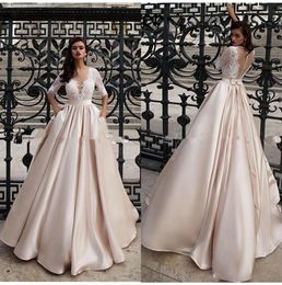 Light Champagne Satin A Line Wedding Dresses Sheer Long Sleeves Tulle Lace Applique Sweep Train Wedding Dress Bridal Gowns With Pockets