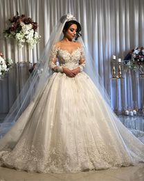 New Vintage Arabic A Line Wedding Dresses Jewel Neck Long Sleeves Illusion Lace Applique Crystal Beaded Tulle Ball Gown Formal Bridal Gowns