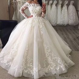 Spring 2020 Big Puffy Ball Gown Wedding Dresses Off The Shoulder Neckline Sheer Long Sleeves Beautiful Lace and Tulle Bridal Gowns Customize