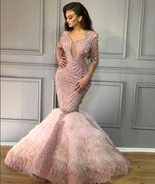 Mermaid Yousef Aijasmi Evening Dresses Long Sleeve V Neck Beading Crystals Feather Dubai Arabic Prom Gowns Caftan Abendkleider