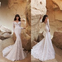 2020 Arabic Mermaid Wedding Dresses V Neck Long Sleeves Appliqued Lace Court Train Bridal Gown Illusion Backless Vestidos De Novia