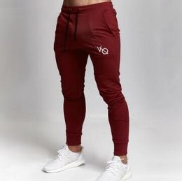 2019 New fashion Men Spring Pencil Pants Gyms clothing in men pants Skinny casual trousers pants top quality sweatpants269Q
