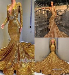 2020 New Sexy Gold Mermaid Prom Evening Dress Sparkly Sequins Long Sleeve V Neck Formal Party Gown Tassels Pageant Gown