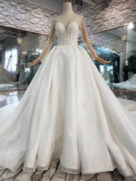 Luxury Design Ball Gown Weeding Dresses Sparkly Crystal Beading Long Sleeve Bridal Gowns Plus Size Sweep Train Real Picture Wedding Dress