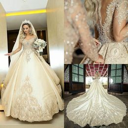 Long Tail Satin Ball Gown Wedding Dresses 2020 New Sheer Long Sleeves Lace Appliques Beaded Chapel Train Bridal Gowns Plus Size AL4205