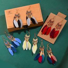 jewelry Popular fan-shaped tassel Feather Earrings women's long Bohemian pearl European and American Dangle Earrings