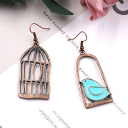 Hot Fashion Jewelry Women's Hollow Cage Bird Pendant Asymmetric Earrings Dangle Earrings S392