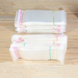 1000pcs 4*14cm Clear Clear Self Adhesive Cellophane Bag Self Sealing Small Plastic Bags Candy Gift Jewelry Packaging Bag