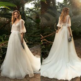 Wedding Dresses Jewel Long Sleeve Appliqued Lace Sequins Beaded A Line Bridal Dress Sexy Backless Ruched Sweep Train Beach Robes De Mariée