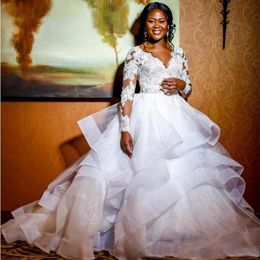 2020 Luxury Saudi African Ruffles Wedding Dresses Ball Gown With Illusion Long Sleeve Applique Lace Beaded Sequins Layers Plus Size Bridal