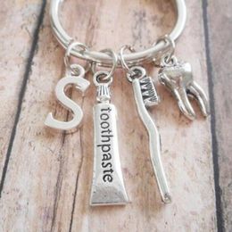 Fashion Jewellery Ancient Silver Toothbrush toothpaste teeth alphabet dentist pendant key chain Men Women Holiday Gift Keychain 178