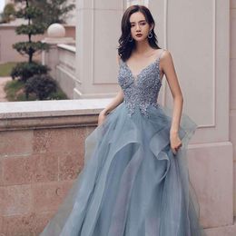 Women S Tulle Spaghetti Straps Long Prom Dresses Grey Beaded Applique Backless Formal Party V Neck Sexy Evening Dress