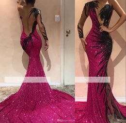 New Fuchsia Mermaid Prom Dresses Backless Sequined One Shoulder Long Sleeves Black Appliques Sweep Train African Party Evening Gowns