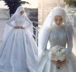 Högkvalitativ ny muslim arabisk bröllopsklänning En linje Hög Neck Lace Beading Långärmad Land Trädgård Bröllopklänningar